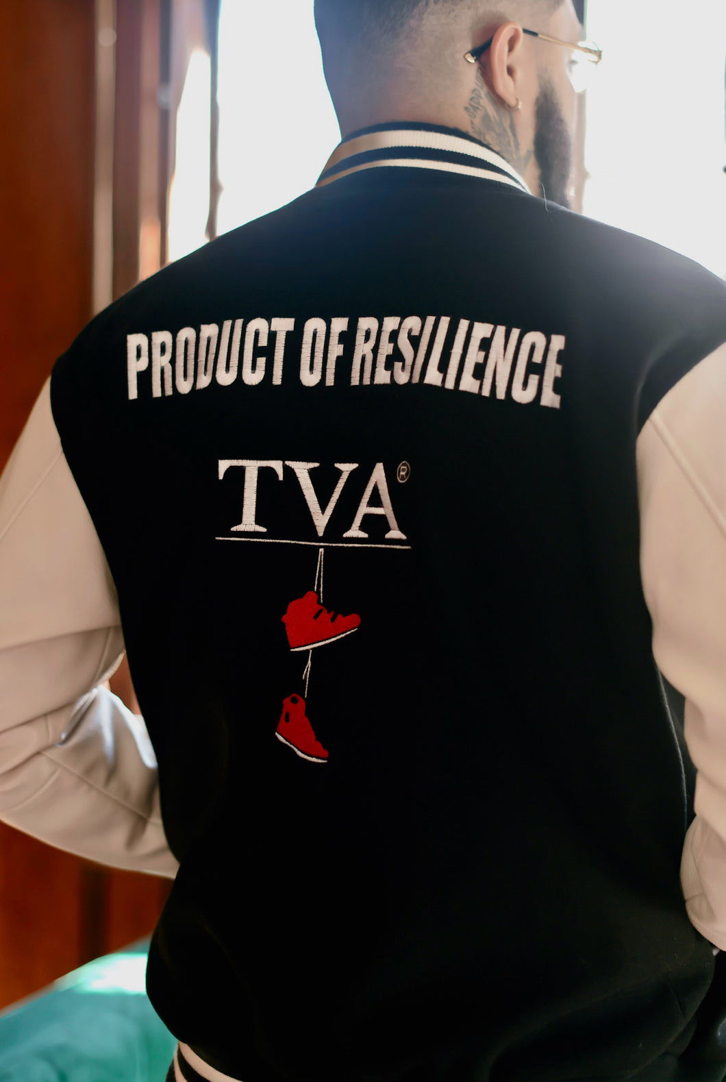 “Product of Resilience” Letterman jacket